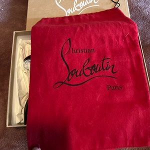 Christian Louboutin black pumps